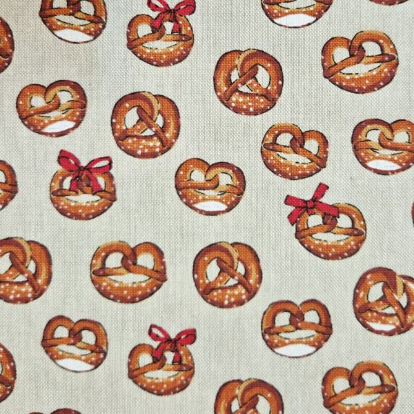 Stoff Meterware Baumwolle pflegeleicht "Brezeln" natur beige braun 0,5